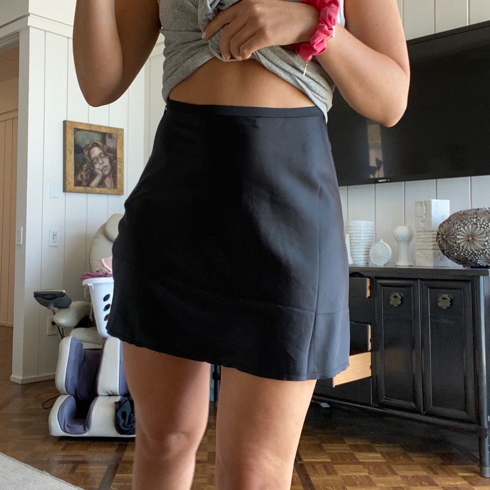Silk mini black skirt. NEVER WORN